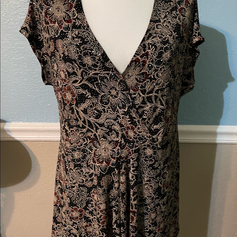 Women’s holiday blouse. Black with burgundy, gold and blue accents. Stretchy
